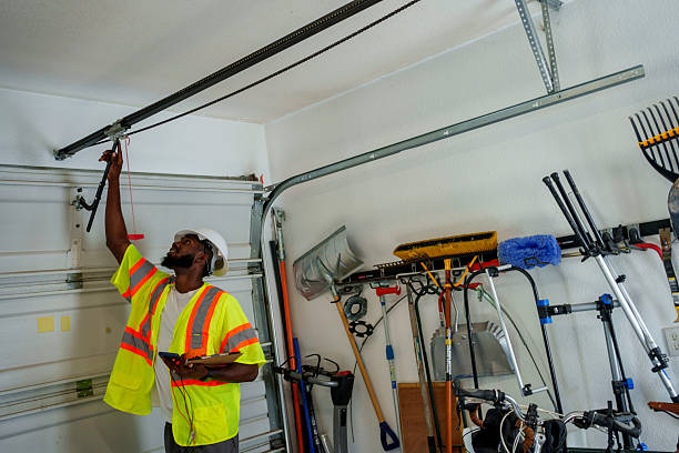 Professional Garage Door Panel Replacement technician working in West Des Moines, IA